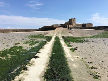 View of fort against cloudy sky