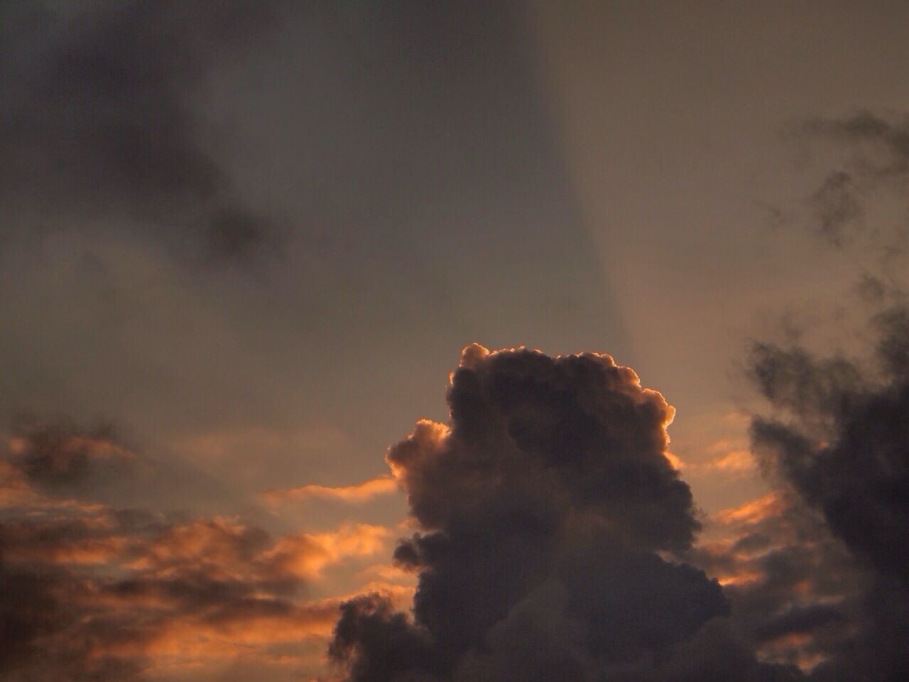 sky, low angle view, cloud - sky, sunset, beauty in nature, scenics, cloudy, tranquility, nature, tranquil scene, cloudscape, sky only, silhouette, cloud, weather, idyllic, dramatic sky, overcast, outdoors, orange color