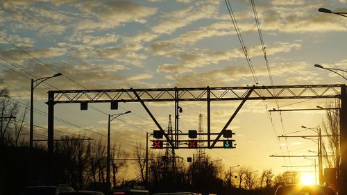 Silhouette of road against sky during sunset