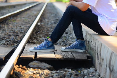 Low section of person on railroad track