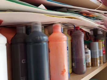 Close-up of multi colored bottles