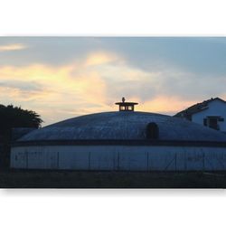 Built structure against sunset sky