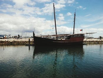 Ship moored at harbor