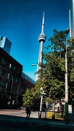 Low angle view of buildings against blue sky