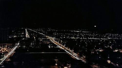 View of illuminated city at night