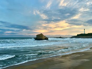 Scenic view of sea against sky during sunset