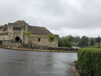 Historic building against cloudy sky