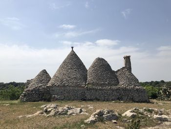 Ancient building against sky