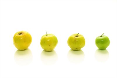 Close-up of apples on white background