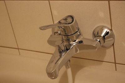 High angle view of faucet in bathroom