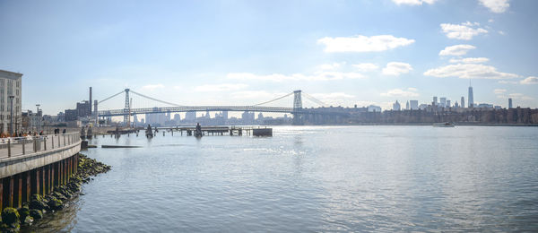 Bridge over river against sky