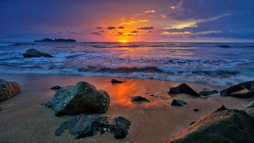 Scenic view of sea against sky during sunset