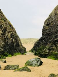 Scenic view of rocks against sky