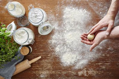 High angle view of person preparing food on table