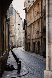 Rear view of man walking in city