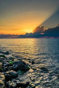 Scenic view of sea against sky during sunset