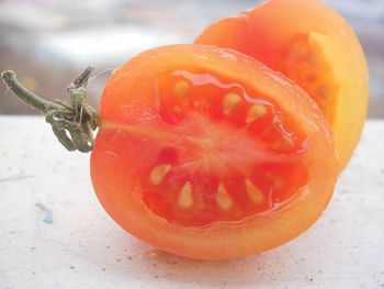 Close-up of orange slices on table