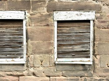 Closed window of old building