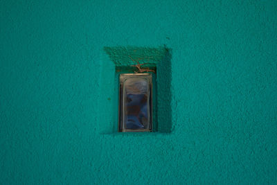 Low angle view of closed window of building