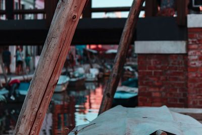 Close-up of wooden post in river