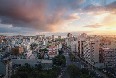 High angle view of cityscape against sky during sunset