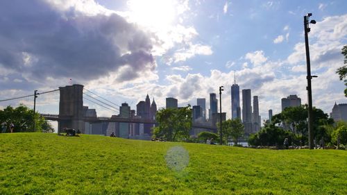 View of buildings against cloudy sky