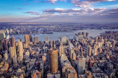 Aerial view of city buildings against sky