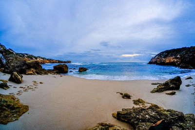 Scenic view of beach against sky