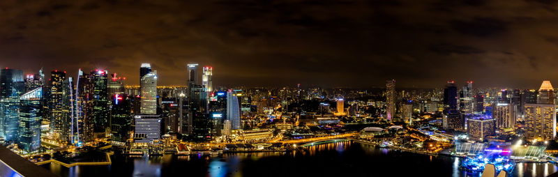 High angle view of illuminated cityscape at night
