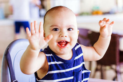 Portrait of cute baby boy at home