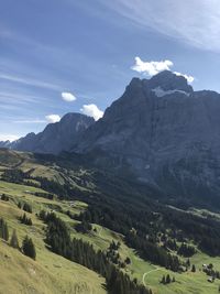 Scenic view of landscape and mountains against sky