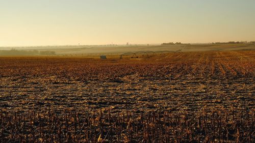 Scenic view of landscape against sky during sunset