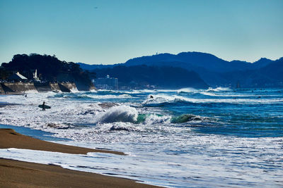 Scenic view of sea against clear sky