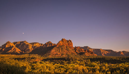 Scenic view of rocky mountains against clear sky