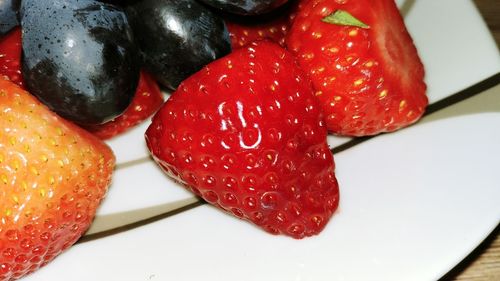 High angle view of strawberries on table