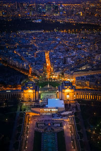 High angle view of illuminated city buildings at night