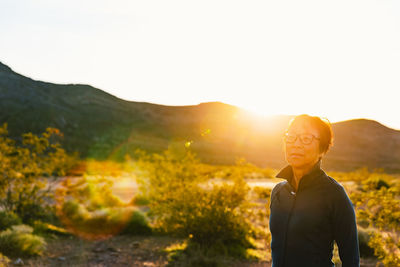 Senior asian woman portrait at sunset in nevada