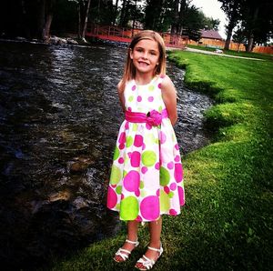 Portrait of girl standing in park