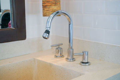 Close-up of sink in bathroom