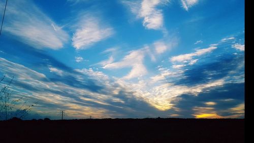 Scenic view of silhouette landscape against sky during sunset