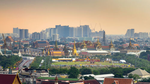 High angle view of buildings in city against clear sky