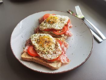 High angle view of breakfast served in plate on table