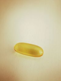 High angle view of yellow pepper against white background