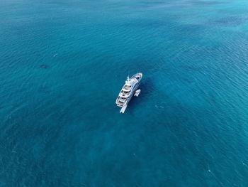 High angle view of boat sailing in sea