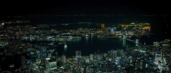 High angle view of illuminated city buildings at night, tokyo-japan