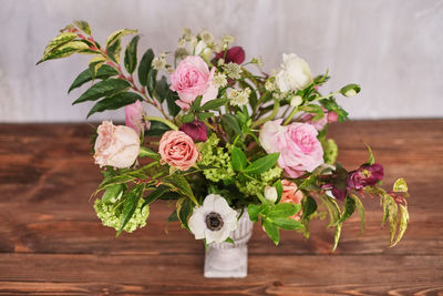 Close-up of pink roses on table