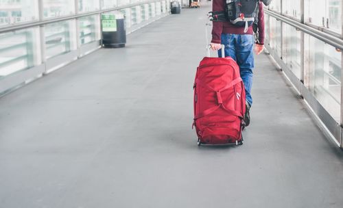 Low section of people walking on road