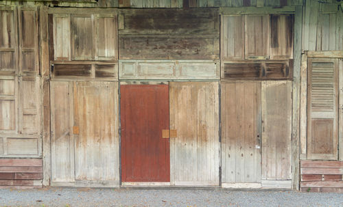 Closed wooden door of old building