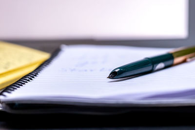 Close-up of pen on table