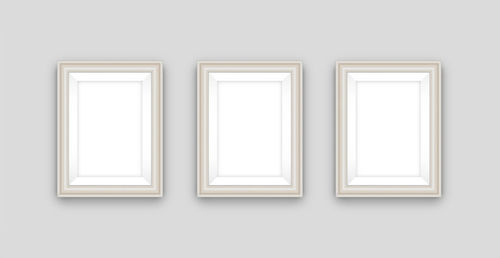 Close-up of empty picture frame against white background